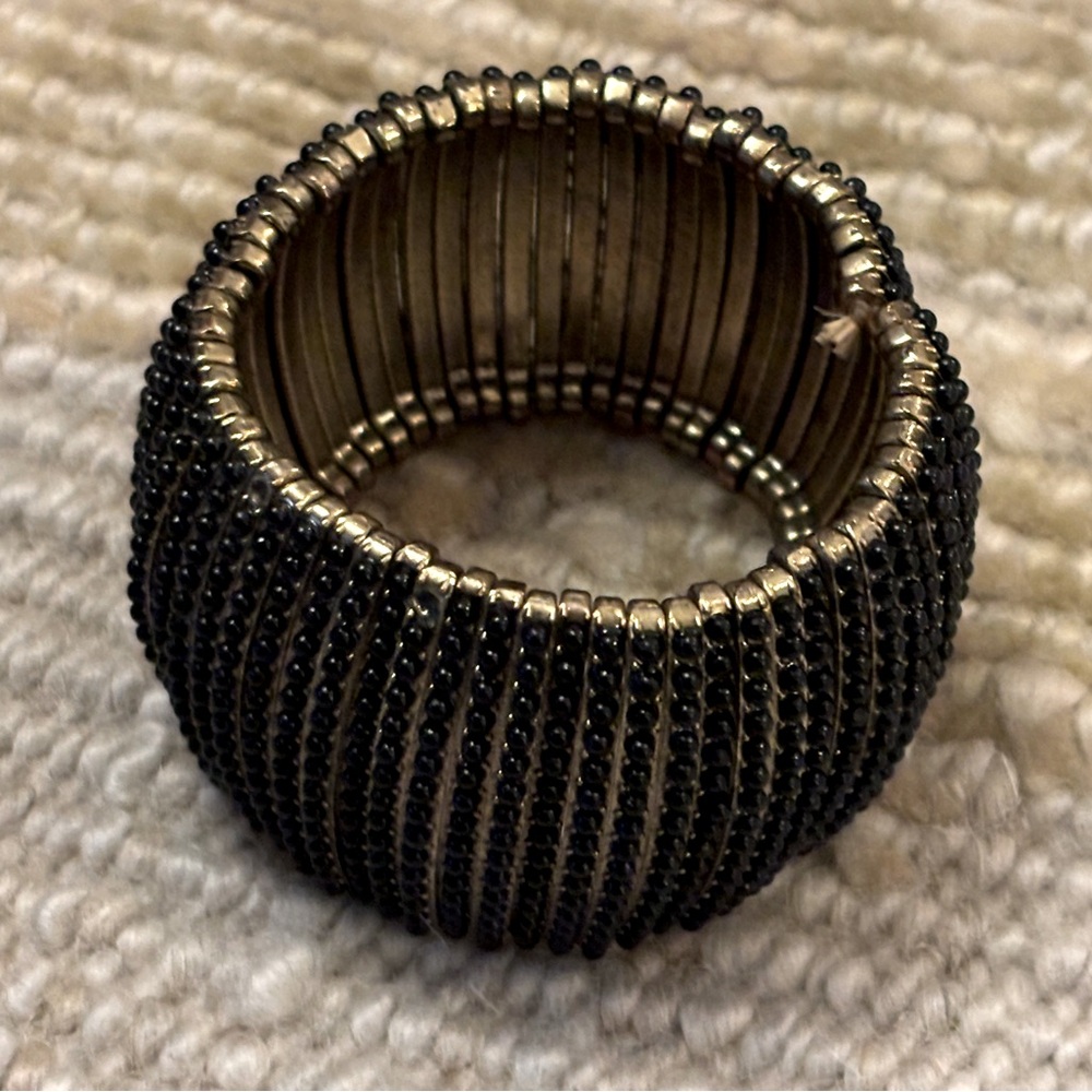 Bangle bracelet black bead and gold
